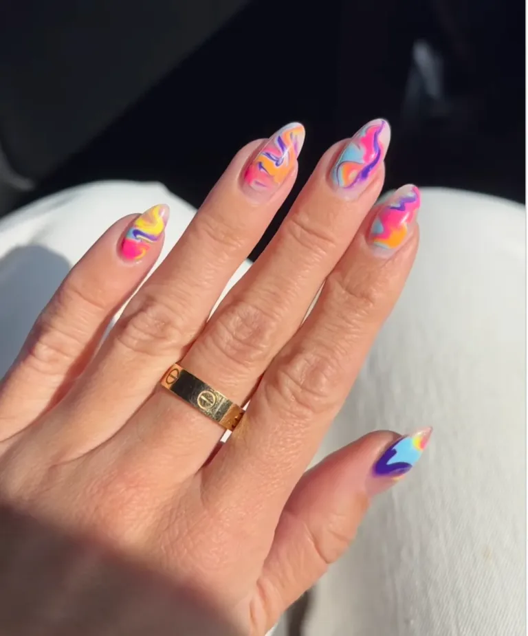 swirl nails and negative space manicure 2024 nail trends