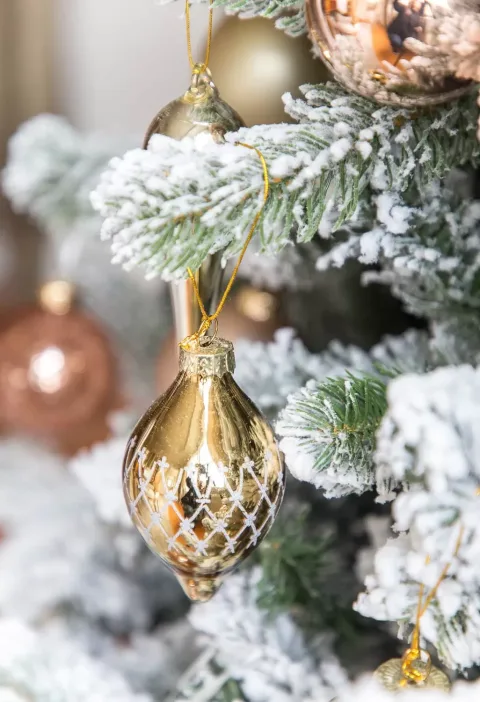 I like to play with varied shapes and sizes, and my ornaments include finials, as well as orbs for a more interesting look!!
